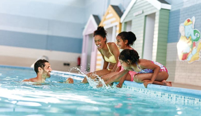 Family by the pool at Hoseasons resort 